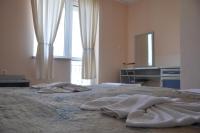 Postel nebo postele na pokoji v ubytování Hotel BelleVille