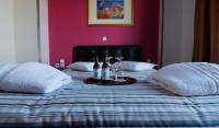 Posteľ alebo postele v izbe v ubytovaní Athens Choice Hotel