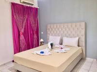 Postel nebo postele na pokoji v ubytování Rethymno Blue Apartments