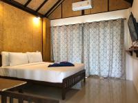 Postel nebo postele na pokoji v ubytování Anattaya Holiday Home
