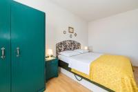 Posteľ alebo postele v izbe v ubytovaní Apartmani Kala