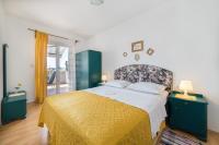 Posteľ alebo postele v izbe v ubytovaní Apartmani Kala