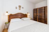 Posteľ alebo postele v izbe v ubytovaní Apartmani Kala