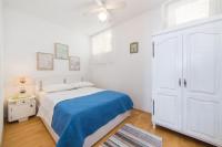 Posteľ alebo postele v izbe v ubytovaní Apartmani Kala