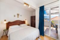 Posteľ alebo postele v izbe v ubytovaní Apartmani Kala