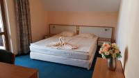 Postel nebo postele na pokoji v ubytování Hotel Villa Bora
