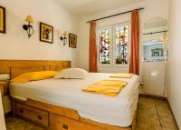 A bed or beds in a room at Casa Charlotte