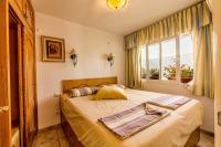 A bed or beds in a room at Casa Charlotte