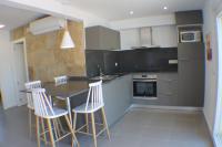 A kitchen or kitchenette at Agi Solimar Atico