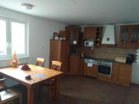 Kuchyň nebo kuchyňský kout v ubytování Apartmány Zaječák