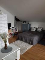 Posteľ alebo postele v izbe v ubytovaní Apartman Atelier
