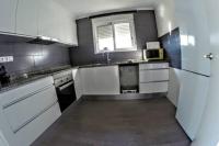 Kuchyň nebo kuchyňský kout v ubytování Apartamento de Cristina