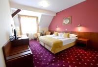 Łóżko lub łóżka w pokoju w obiekcie Hotel Tilia
