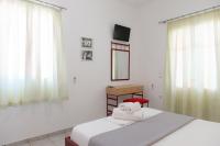 Postel nebo postele na pokoji v ubytování Morpheas Pension Rooms & Apartments