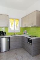 Kuchyň nebo kuchyňský kout v ubytování Morpheas Pension Rooms & Apartments