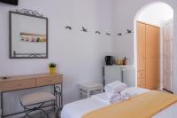 Postel nebo postele na pokoji v ubytování Morpheas Pension Rooms & Apartments