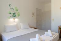 Postel nebo postele na pokoji v ubytování Morpheas Pension Rooms & Apartments