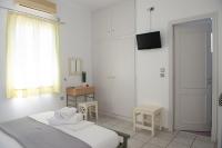 Postel nebo postele na pokoji v ubytování Morpheas Pension Rooms & Apartments