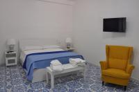 A bed or beds in a room at Calise guest house B senza balcone