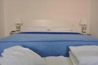 A bed or beds in a room at Calise guest house B senza balcone