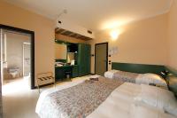 Posteľ alebo postele v izbe v ubytovaní Hotel Eden