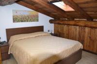 Posteľ alebo postele v izbe v ubytovaní B&B La Casa Sulla Roccia