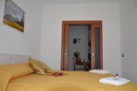 Posteľ alebo postele v izbe v ubytovaní B&B La Casa Sulla Roccia