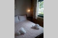 Postel nebo postele na pokoji v ubytování villa roses-mourteri