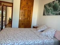 A bed or beds in a room at BADIA BEACH- Empuriabrava