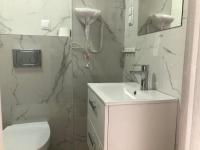 Kúpeľňa v ubytovaní Apartamenty "NaLetniej" Przy Morzu