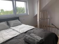 Posteľ alebo postele v izbe v ubytovaní Apartamenty "NaLetniej" Przy Morzu