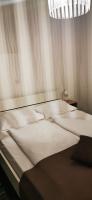 Posteľ alebo postele v izbe v ubytovaní Zadar Street Apartments and Room