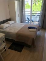 Posteľ alebo postele v izbe v ubytovaní Apartamenty "NaLetniej" Przy Morzu