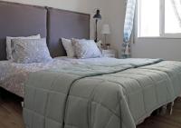 Posteľ alebo postele v izbe v ubytovaní Casa Blue Vista - villa & guestroom