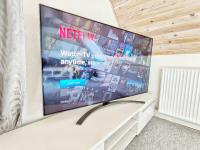 TV a/nebo společenská místnost v ubytování Villa Nida