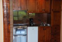 A kitchen or kitchenette at Castell de Riudabella