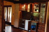 A kitchen or kitchenette at Castell de Riudabella