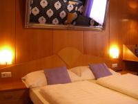Łóżko lub łóżka w pokoju w obiekcie LiebesNesterl Bergwirt - Boutique Hotel
