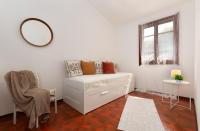 A bed or beds in a room at DomoMea - La Casa di Anna