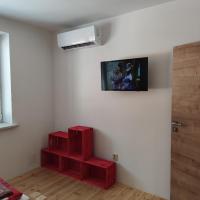 TV a/nebo společenská místnost v ubytování Apartmán Špacír