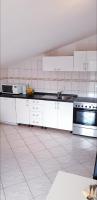 Kuchyň nebo kuchyňský kout v ubytování Apartment Antonio