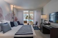 Ein Bett oder Betten in einem Zimmer der Unterkunft Yam Suf by Isrotel Collection