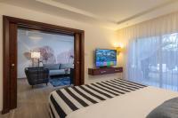 Ein Bett oder Betten in einem Zimmer der Unterkunft Yam Suf by Isrotel Collection