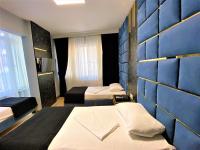 Postel nebo postele na pokoji v ubytování Orange Airport Hotel