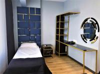 Postel nebo postele na pokoji v ubytování Orange Airport Hotel