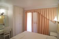 Posteľ alebo postele v izbe v ubytovaní Villa Christina Skiathos