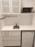 Kuchyňa alebo kuchynka v ubytovaní 1210Apartment