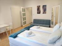 Posteľ alebo postele v izbe v ubytovaní 1210Apartment