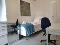 Posteľ alebo postele v izbe v ubytovaní 1210Apartment