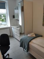 Posteľ alebo postele v izbe v ubytovaní 1210Apartment